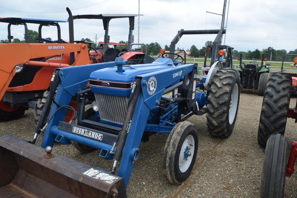 SOLD - FORD 2810 ROPS 2WD ROPS W/ LDR BUCKET 658HRS (WE DO NOT ...