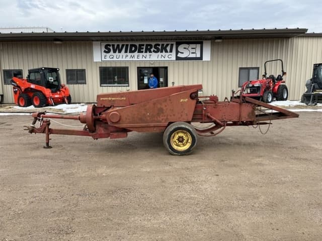 Image of New Holland 310 equipment image 1