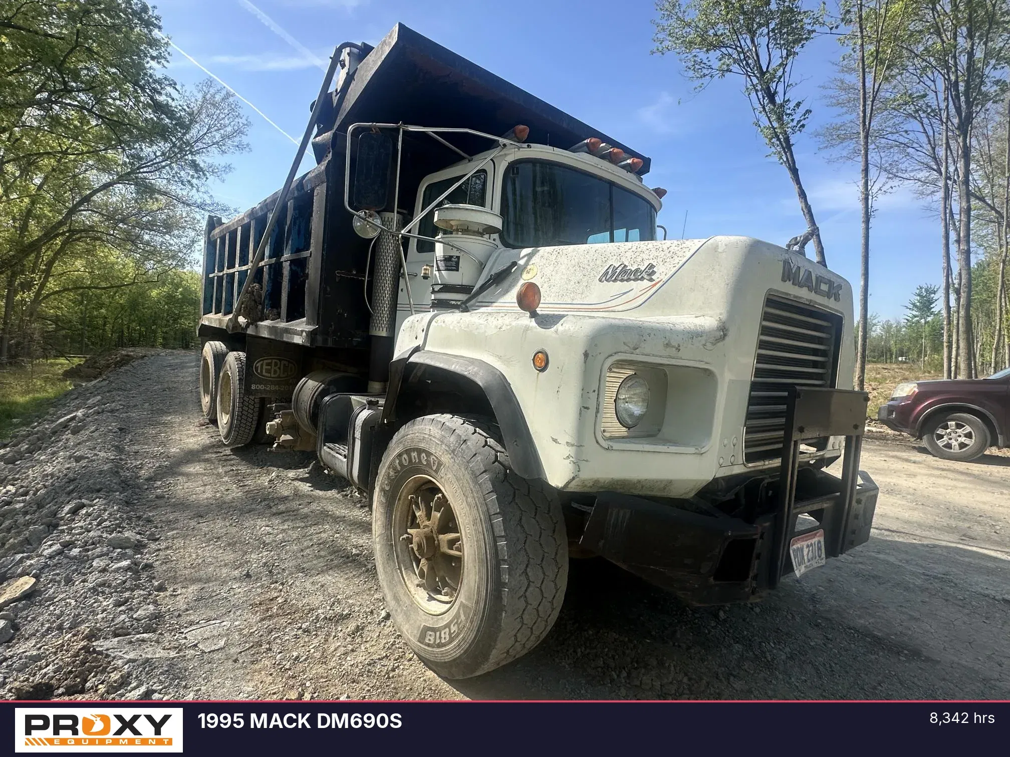1995 Mack DM690S Equipment Image0