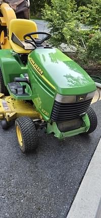 Image of John Deere 325 equipment image 3