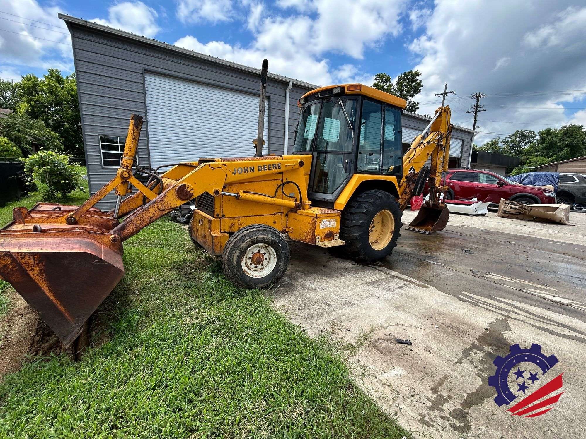 1997 John Deere 310D Equipment Image0