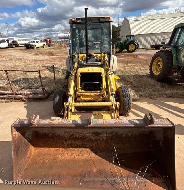 Image of New Holland 555E equipment image 1