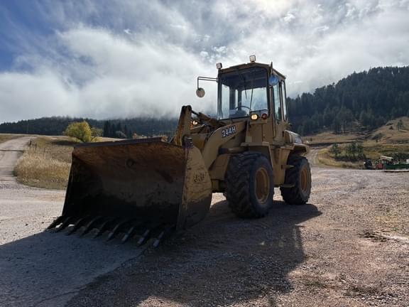 Image of John Deere 244H equipment image 1