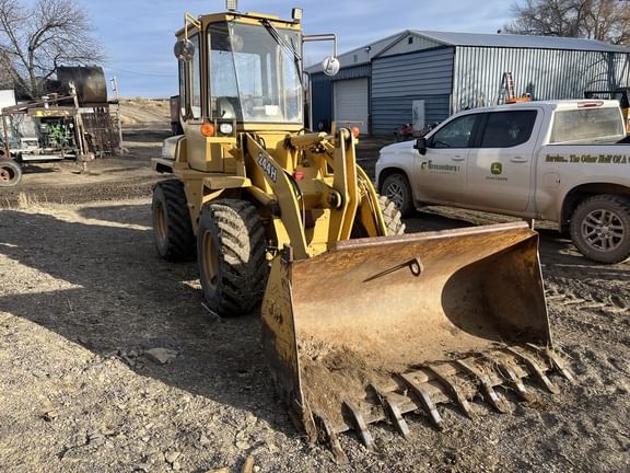 1998 John Deere 244H Equipment Image0