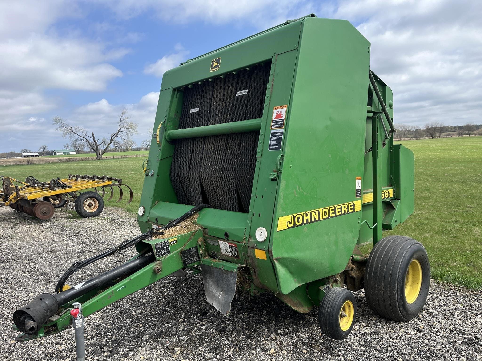 1998 John Deere 566 Equipment Image0