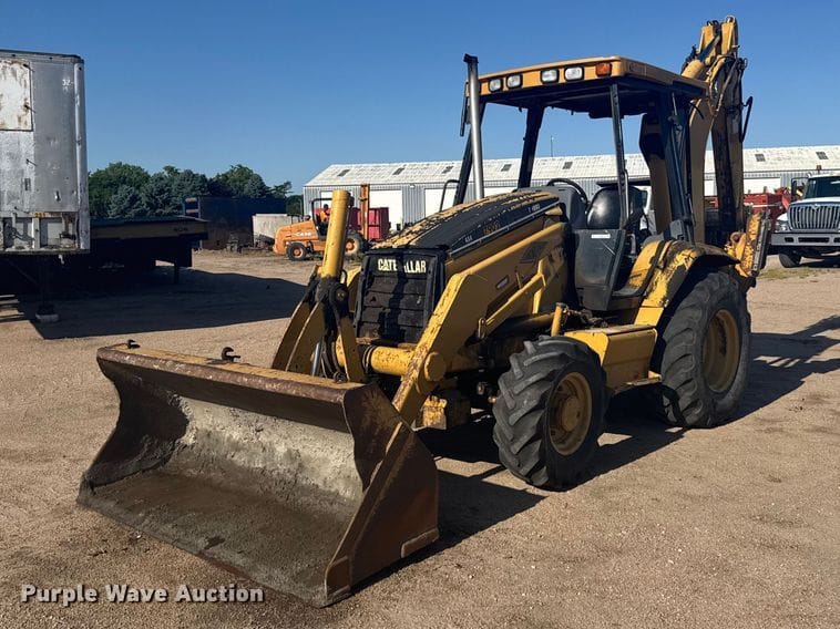 1999 Caterpillar 426C Equipment Image0