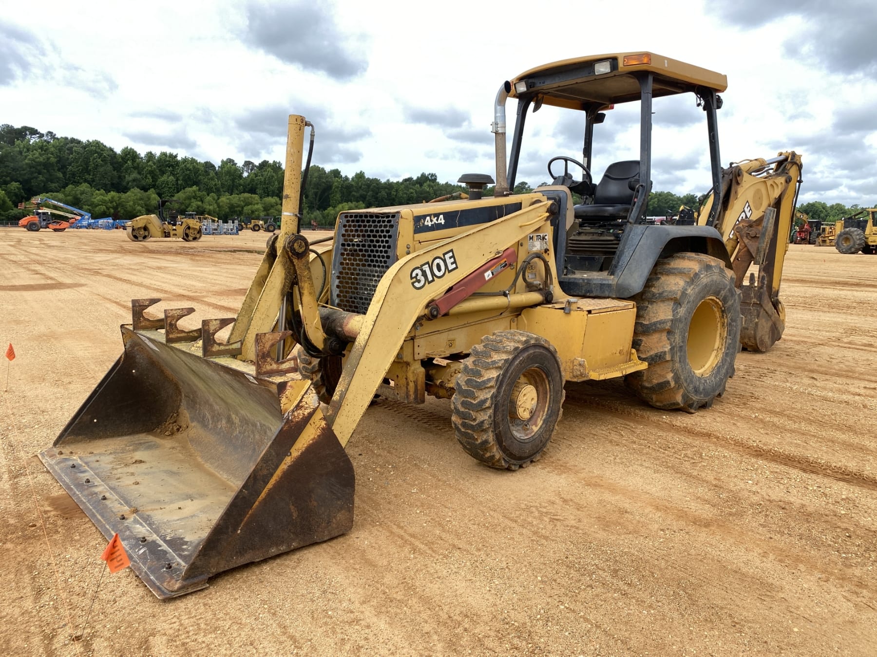 1999 John Deere 310E Equipment Image0