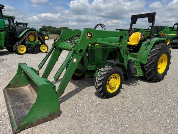 1999 John Deere 6210L Equipment Image0