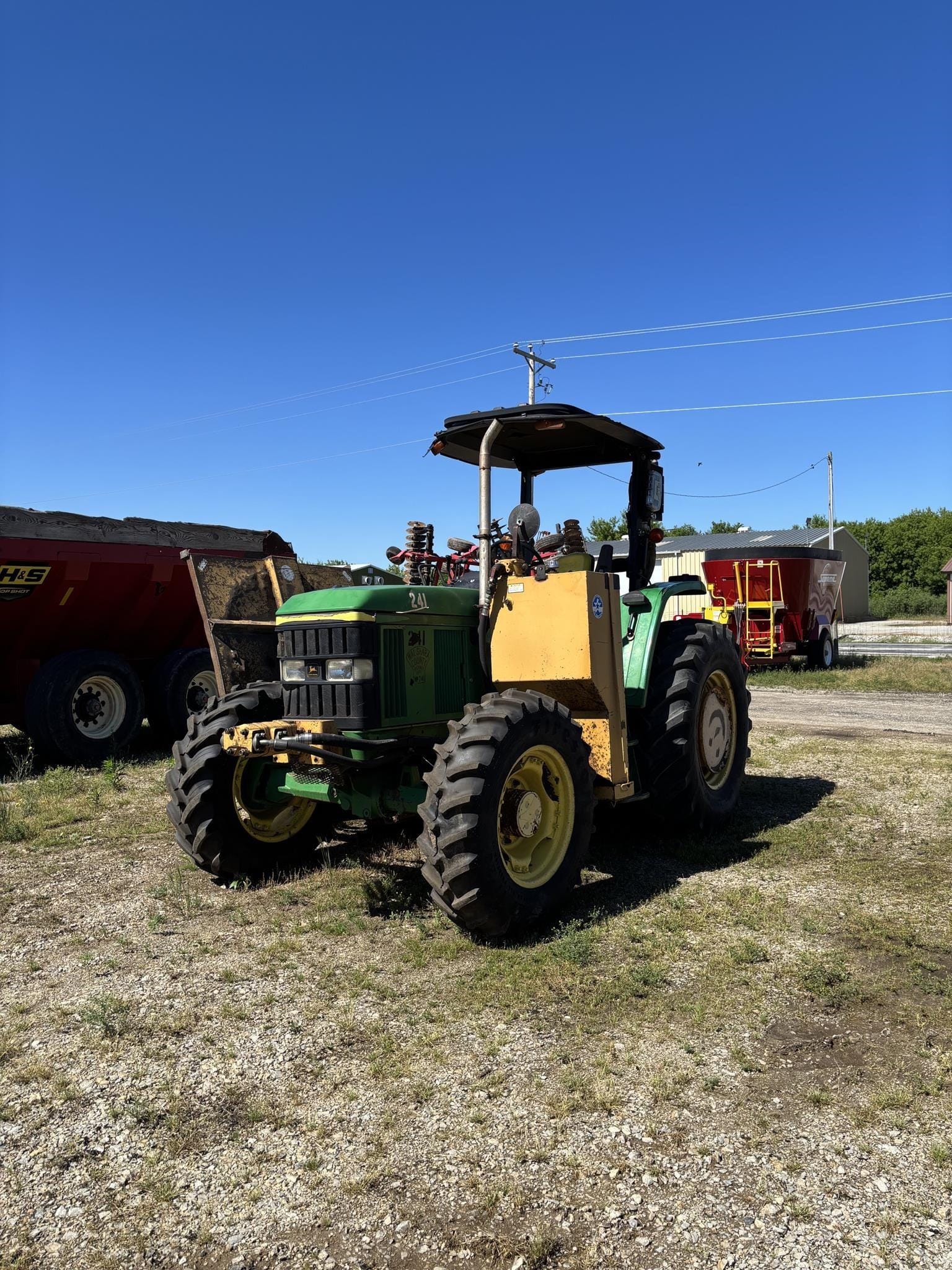 1999 John Deere 6310 Equipment Image0