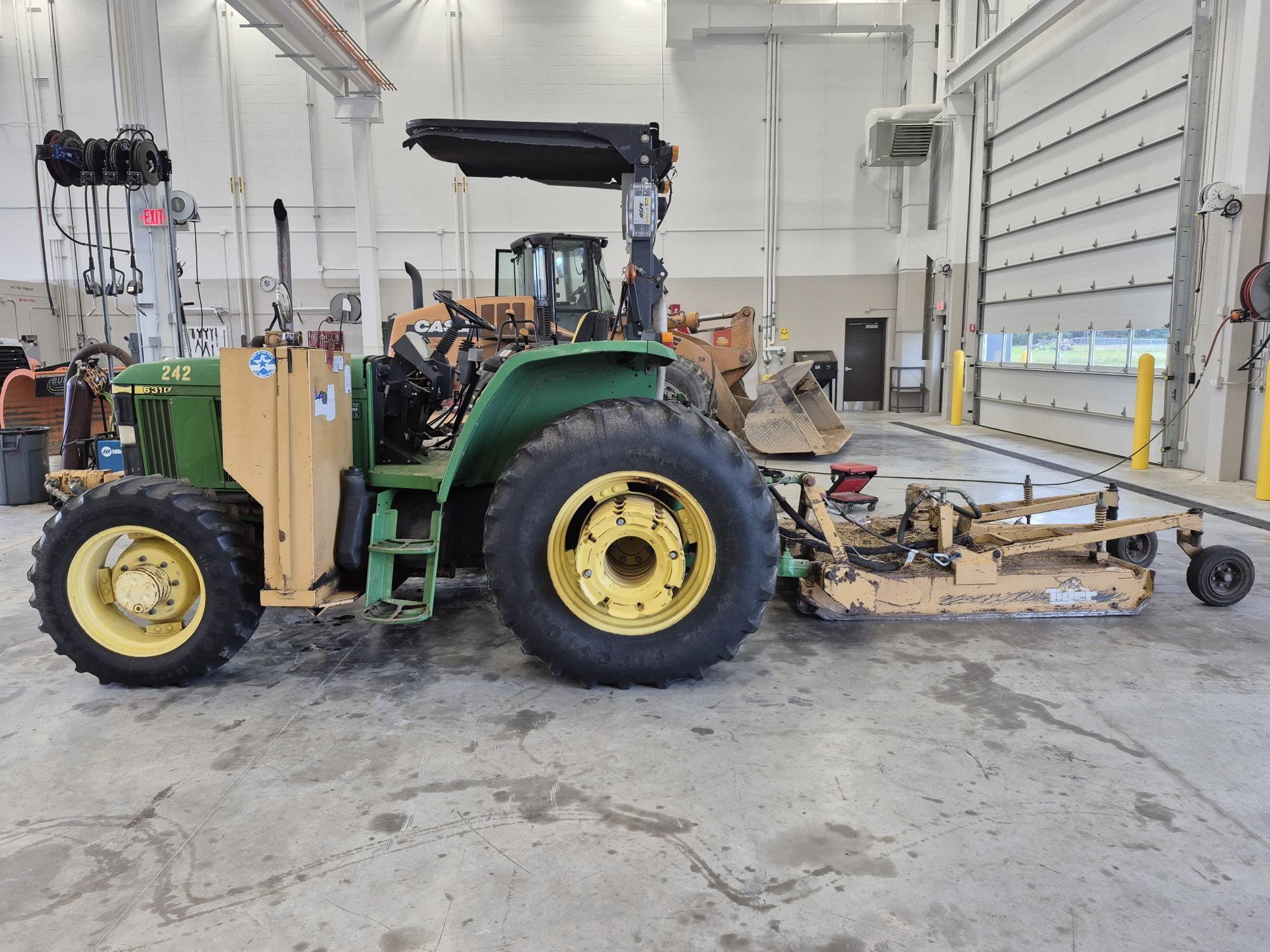 1999 John Deere 6310 Equipment Image0