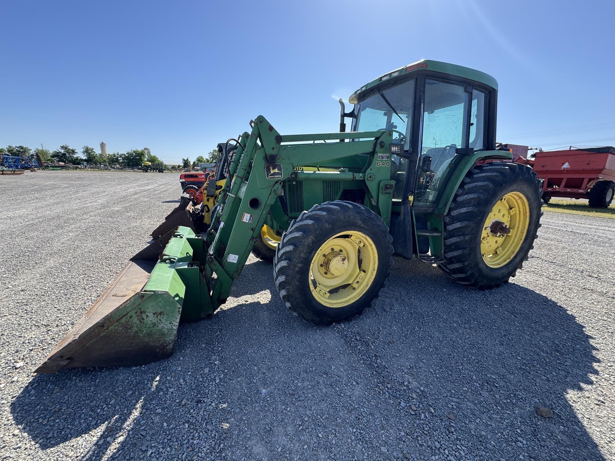 1999 John Deere 6310 Equipment Image0