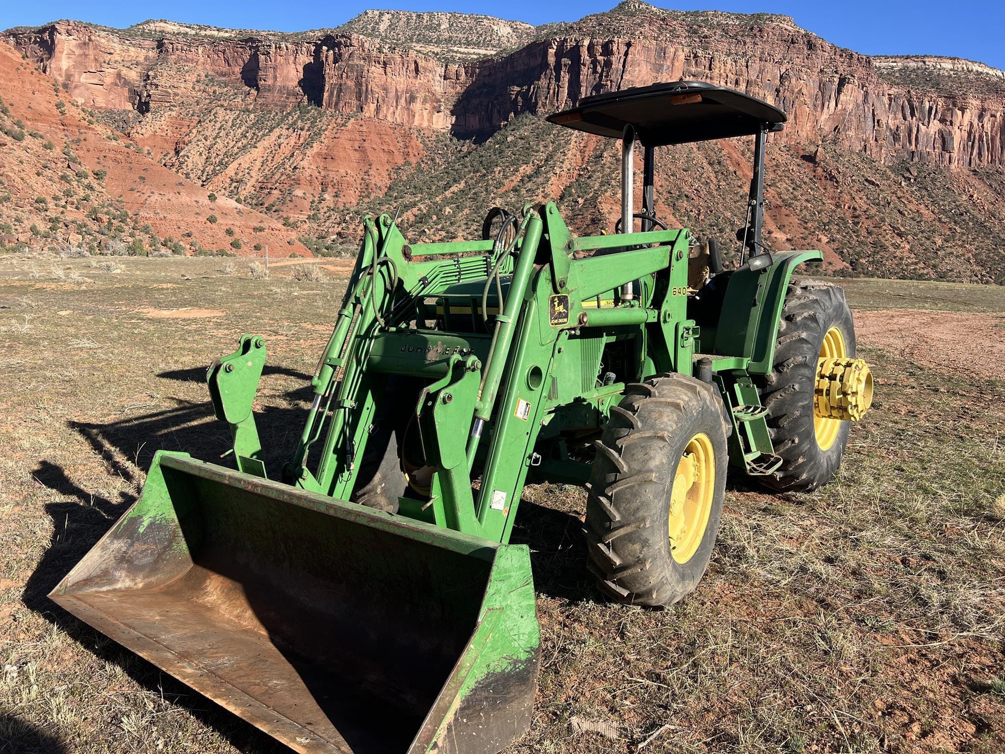1999 John Deere 6310 Equipment Image0
