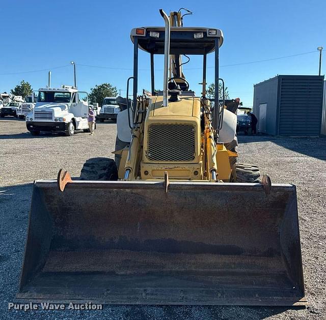 Image of New Holland 555E equipment image 1