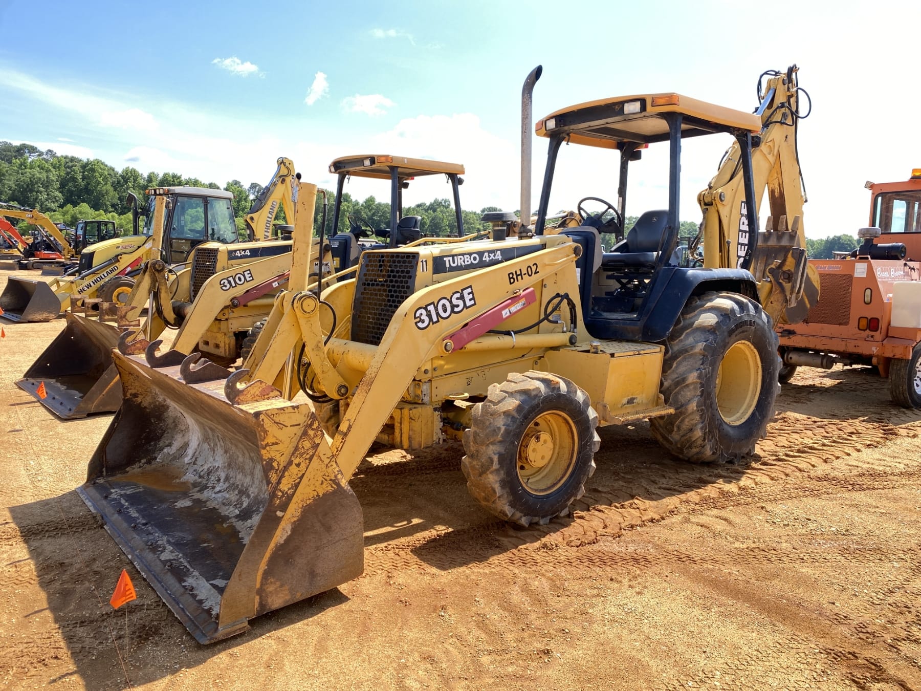 2000 John Deere 310SE Equipment Image0