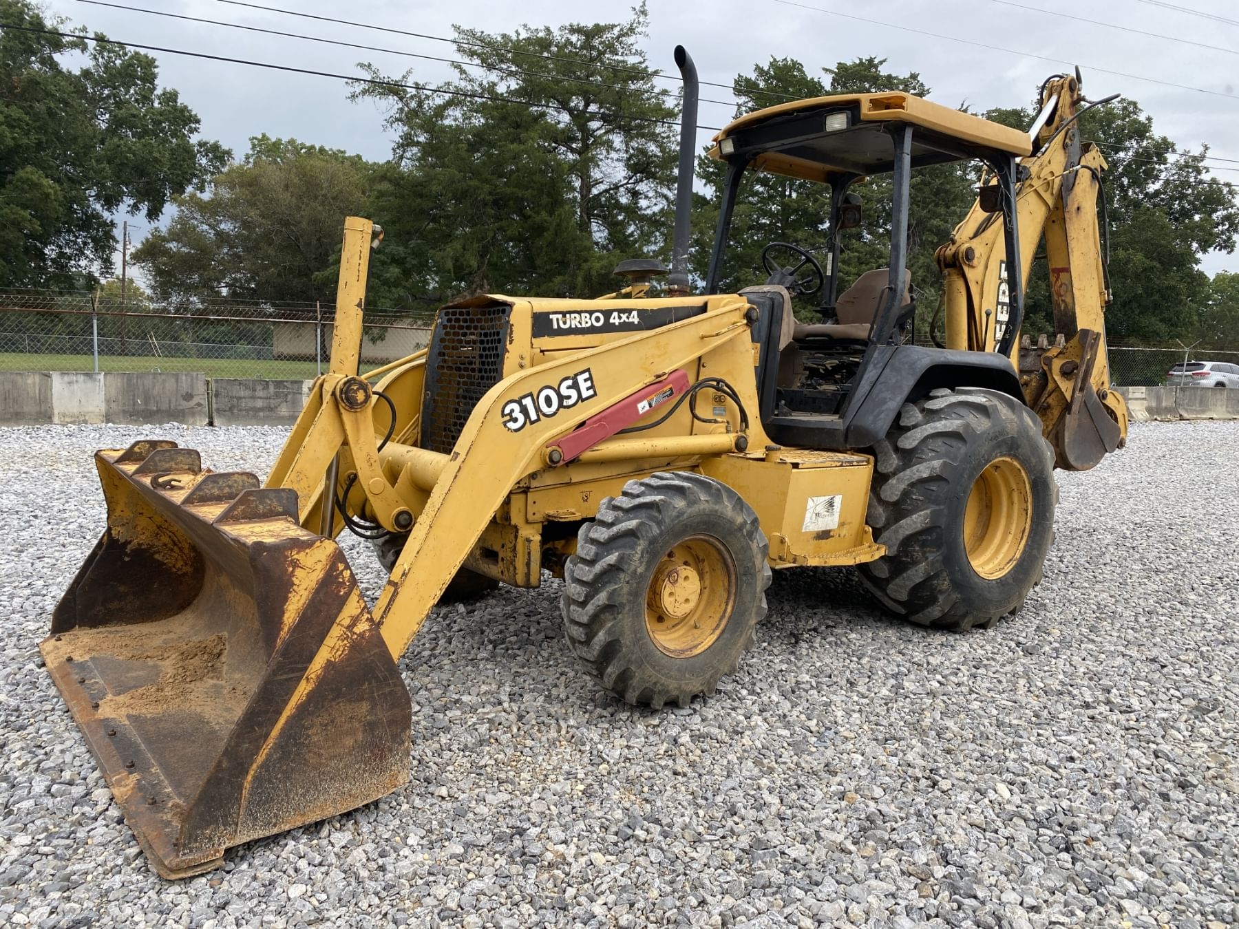 2000 John Deere 310SE Equipment Image0