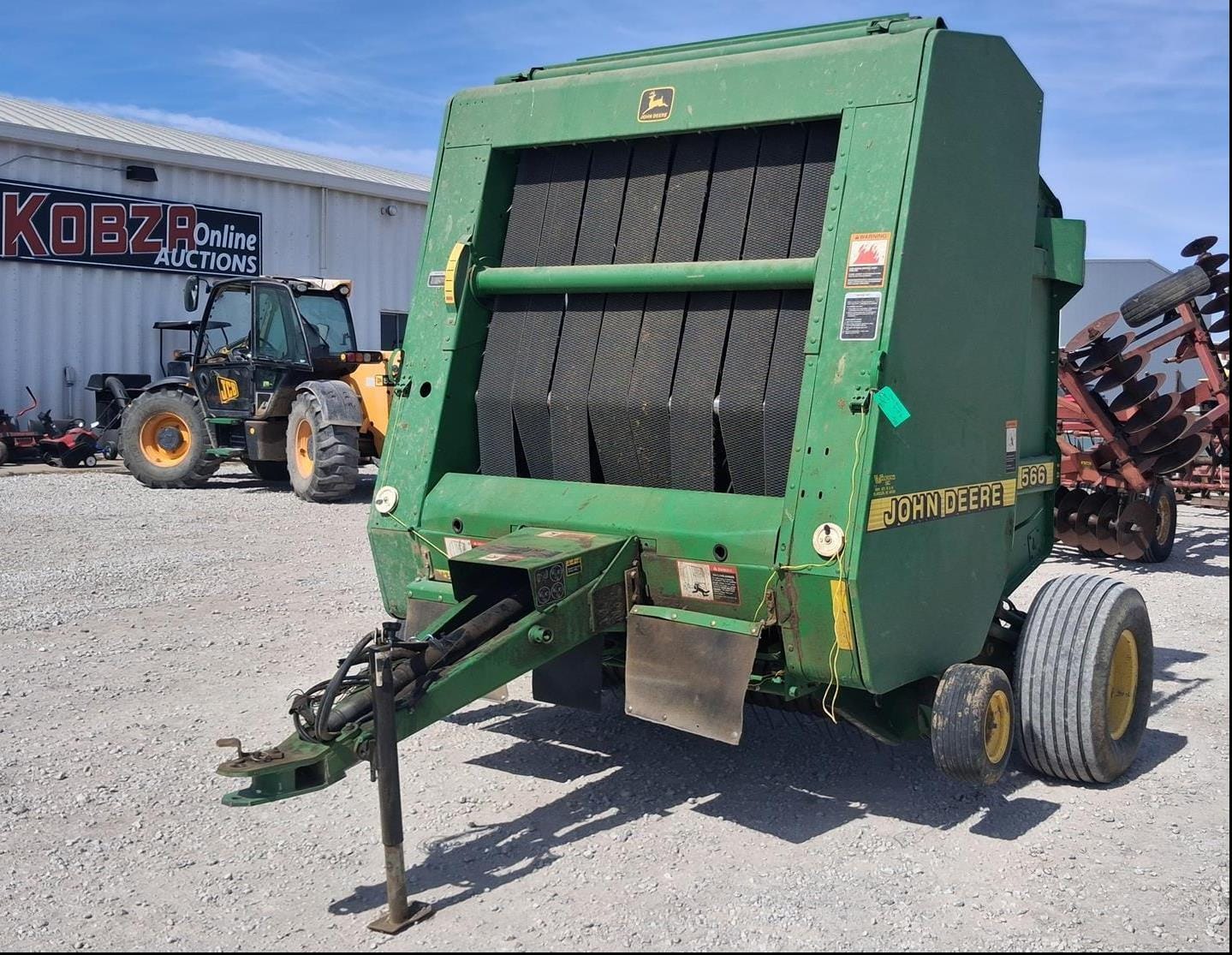 2000 John Deere 566 Equipment Image0