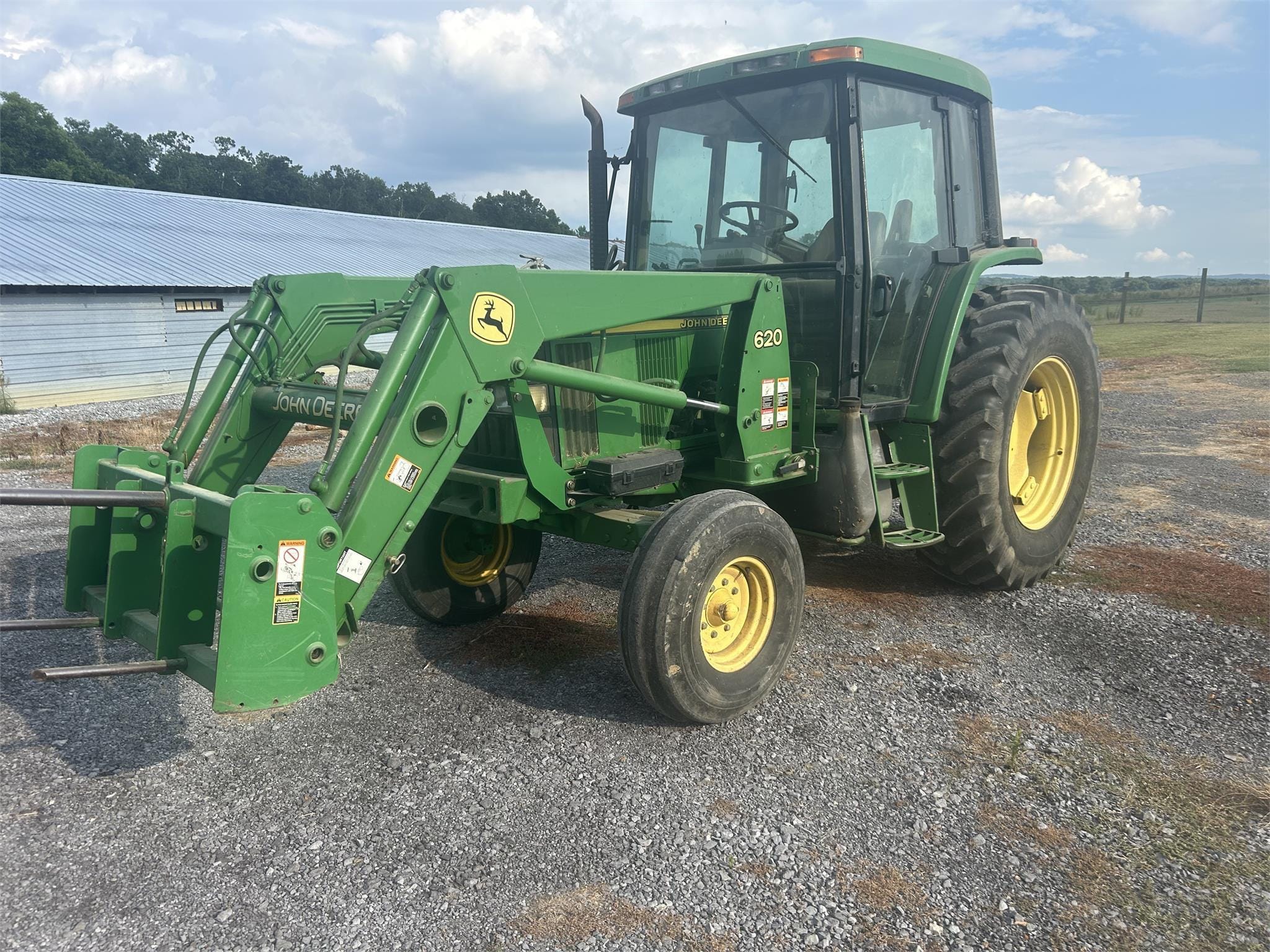 2000 John Deere 6310 Equipment Image0