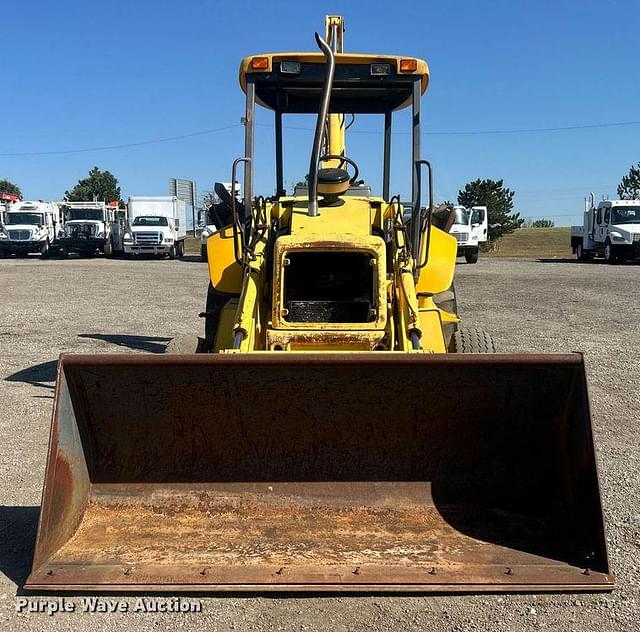 Image of New Holland 555E equipment image 1