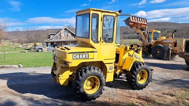 Image of John Deere 244H equipment image 3