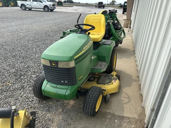 Image of John Deere 325 equipment image 4