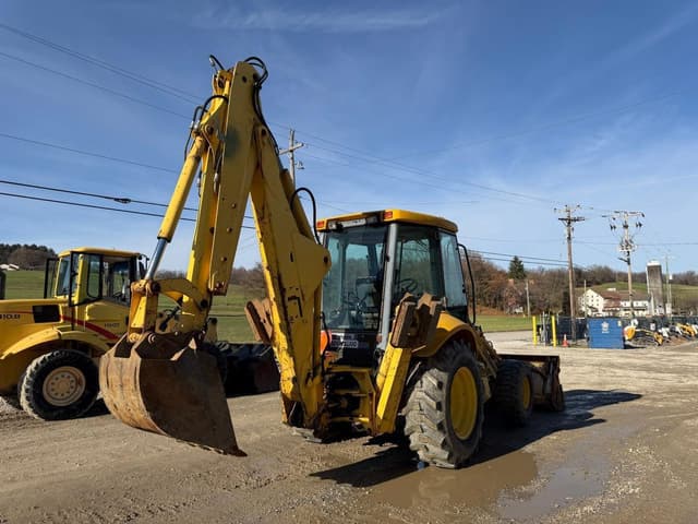 Image of New Holland 555E equipment image 4