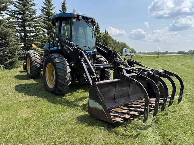 Image of New Holland TV140 equipment image 1
