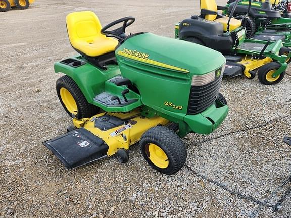 John deere e120 discount stores