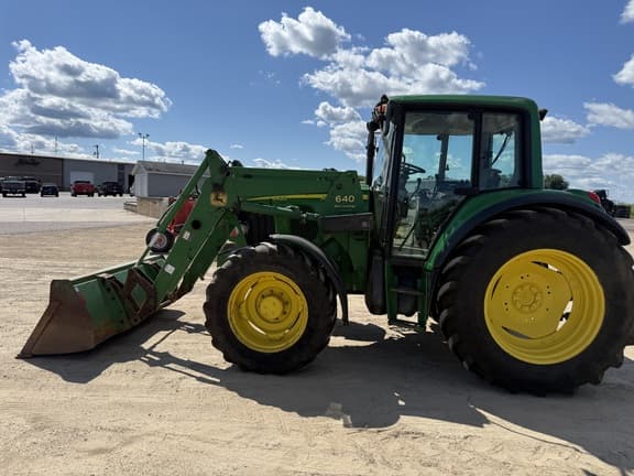 Image of John Deere 6420 equipment image 1