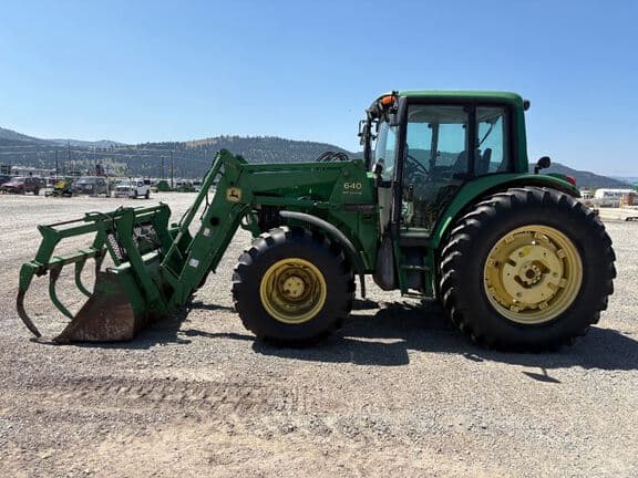 Image of John Deere 6420 equipment image 1