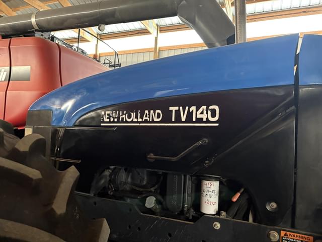Image of New Holland TV140 equipment image 1