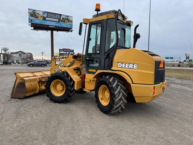 Image of John Deere 304H equipment image 4