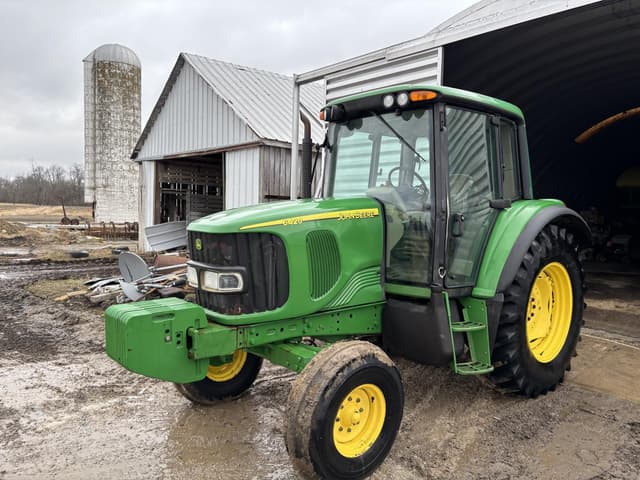 Image of John Deere 6420 equipment image 1