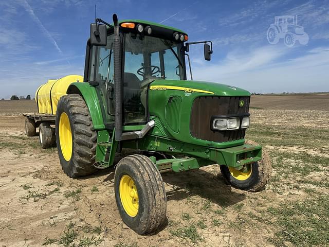Image of John Deere 6420 equipment image 1