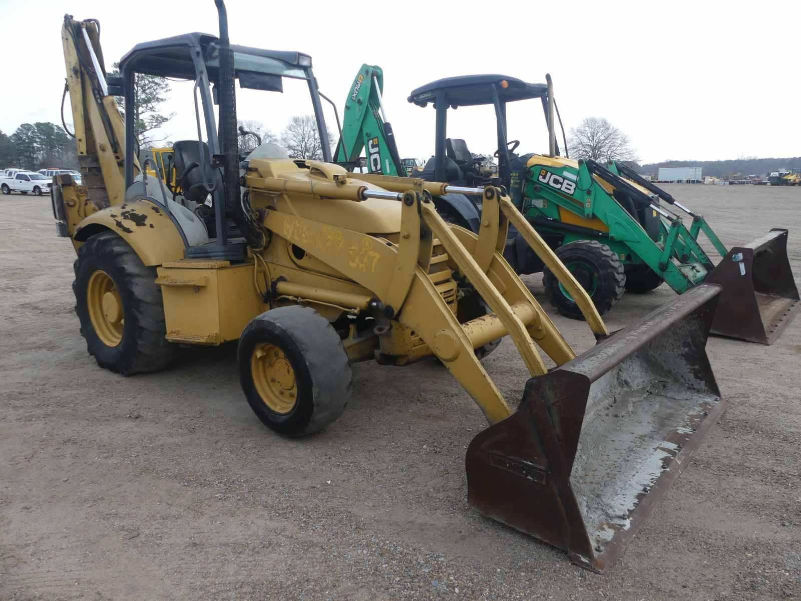 Main image Komatsu WB140-2