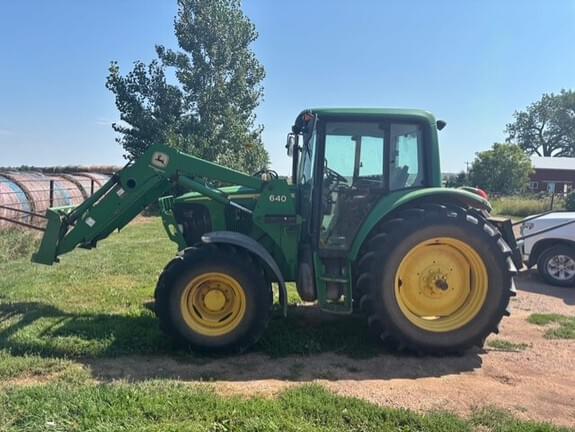 Image of John Deere 6420 equipment image 1