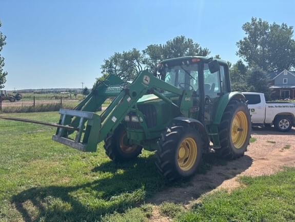 Image of John Deere 6420 equipment image 1