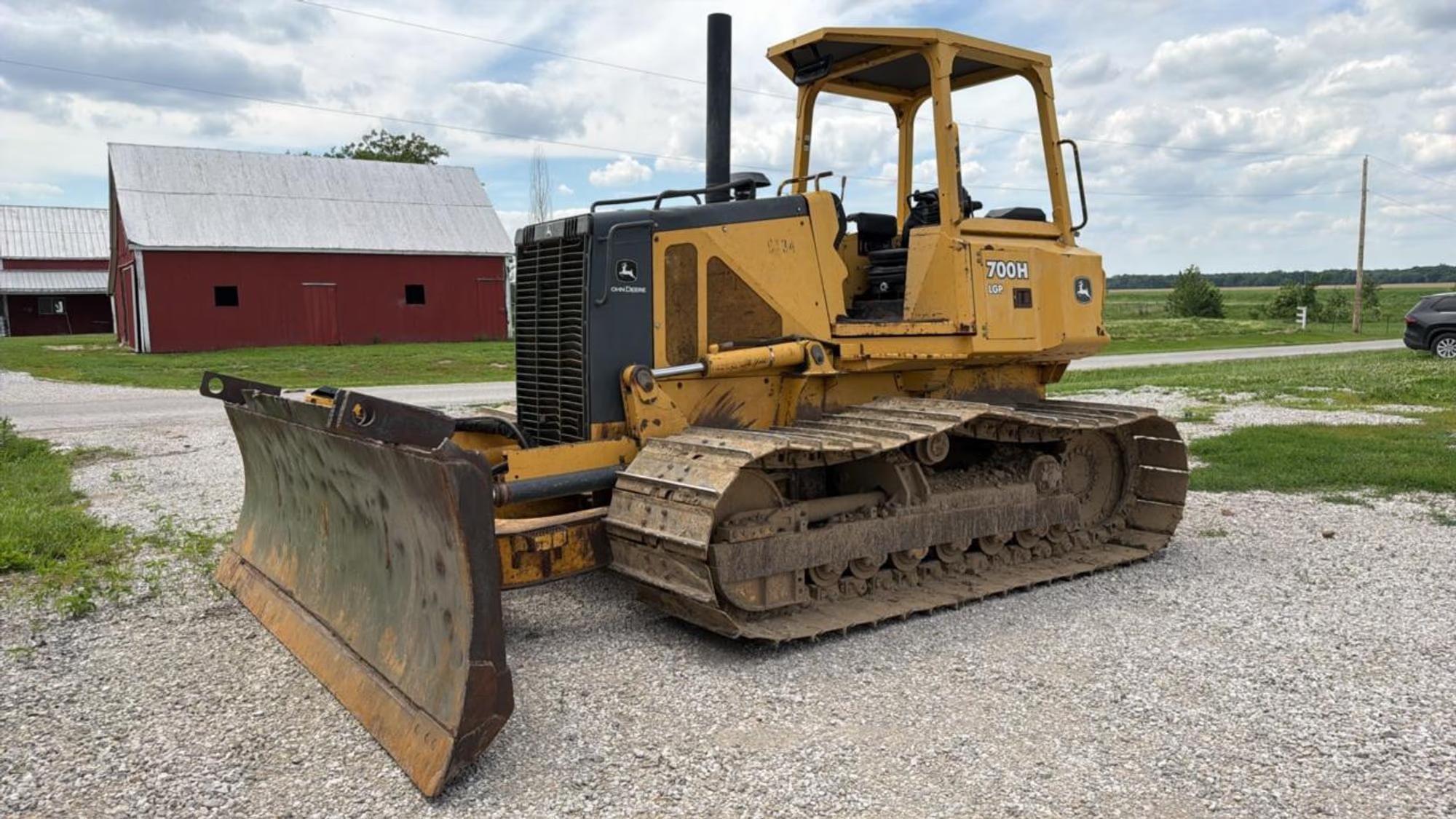 2004 John Deere 700H LGP Equipment Image0