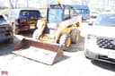 2005 John Deere 325 Image