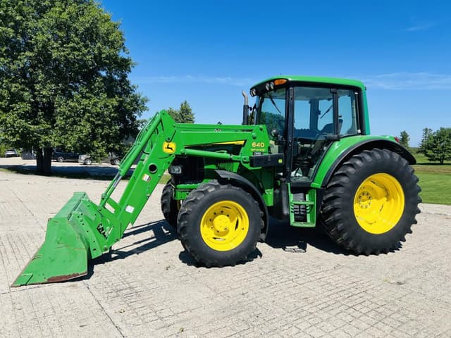 Image of John Deere 6420 equipment image 1