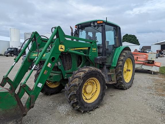 Image of John Deere 6420 equipment image 1