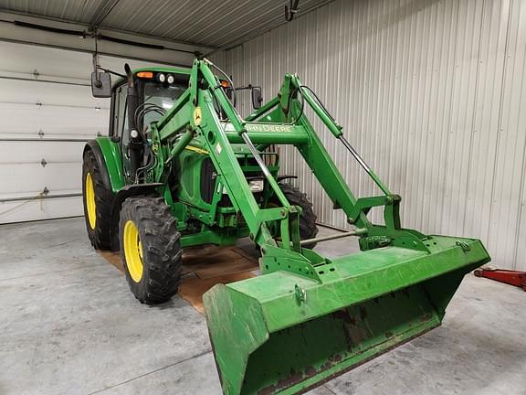 Image of John Deere 6420 equipment image 1