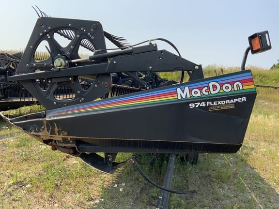 SOLD - 2006 MacDon 974 Stock No. 116611 Harvesting with 36 ft