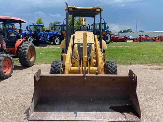 Image of Komatsu WB142-5 equipment image 1