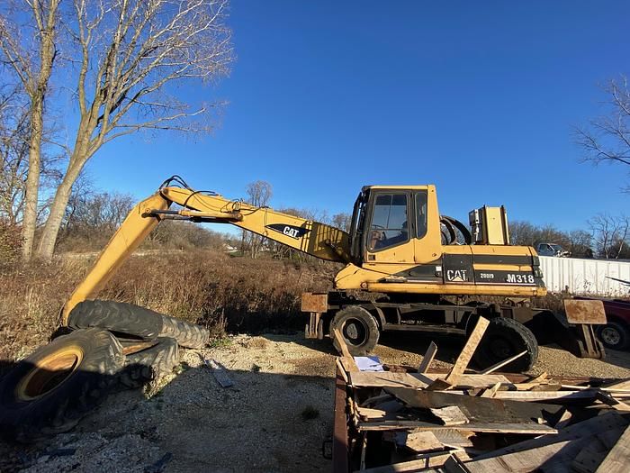 2009 Caterpillar M318 Equipment Image0