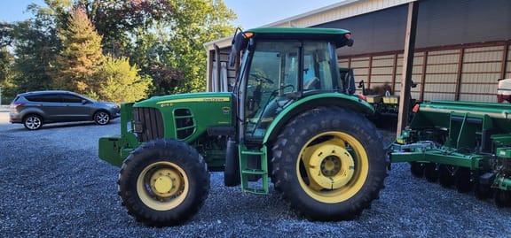 2010 John Deere 6115D Equipment Image0