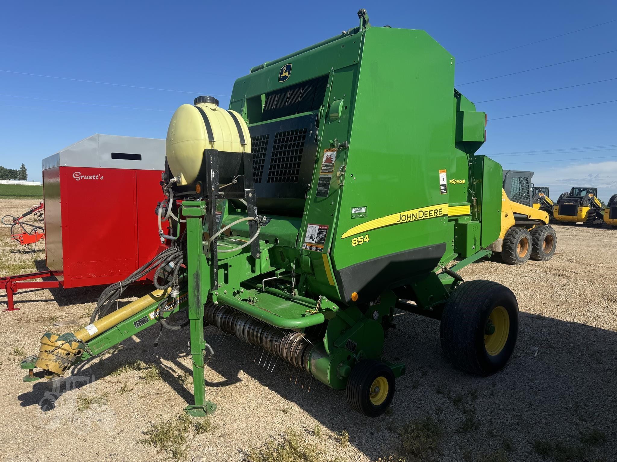 2010 John Deere 854 Silage Special Equipment Image0