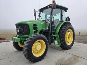 2011 John Deere 6115D Image