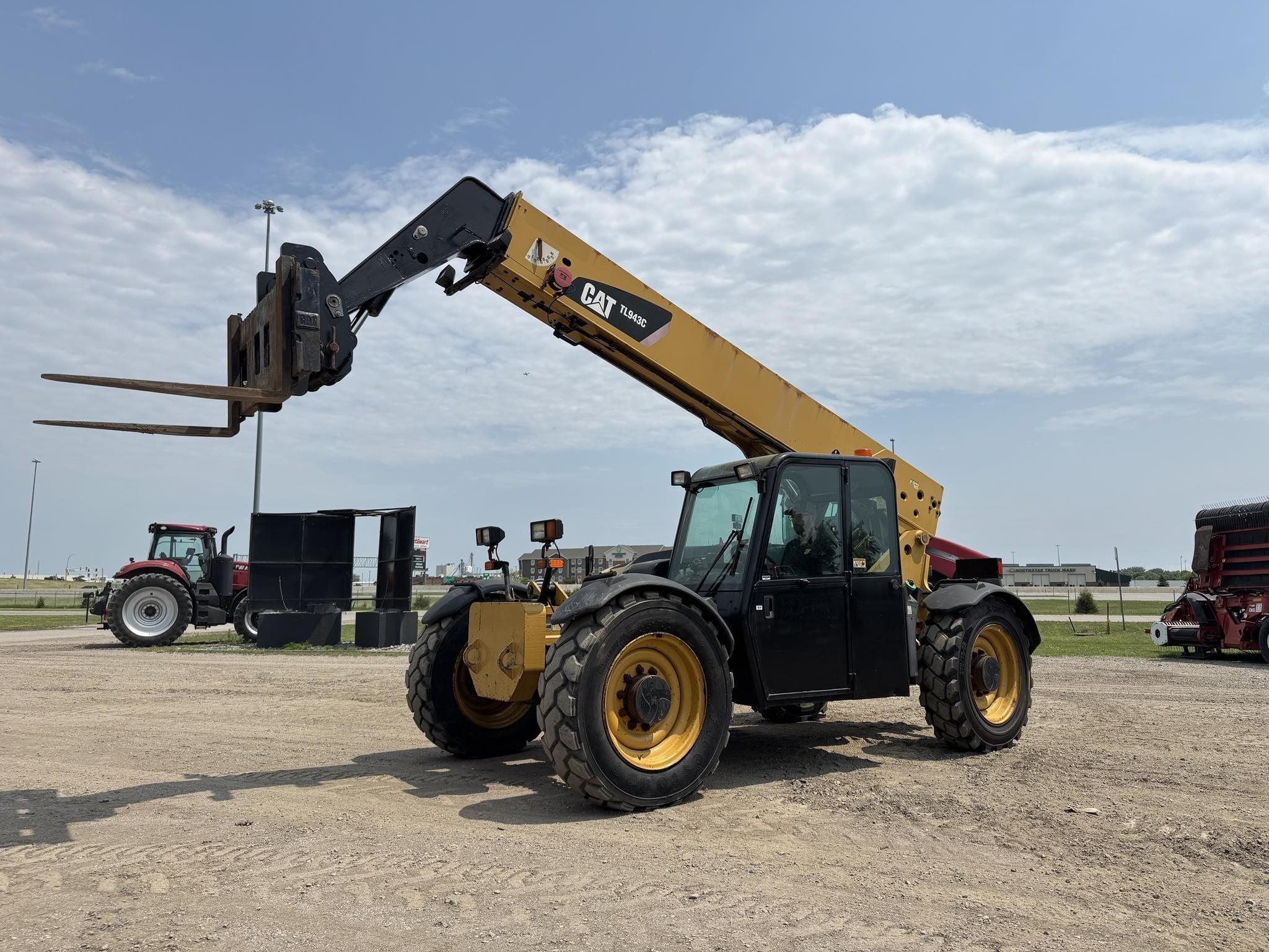 2012 Caterpillar TL943C Equipment Image0
