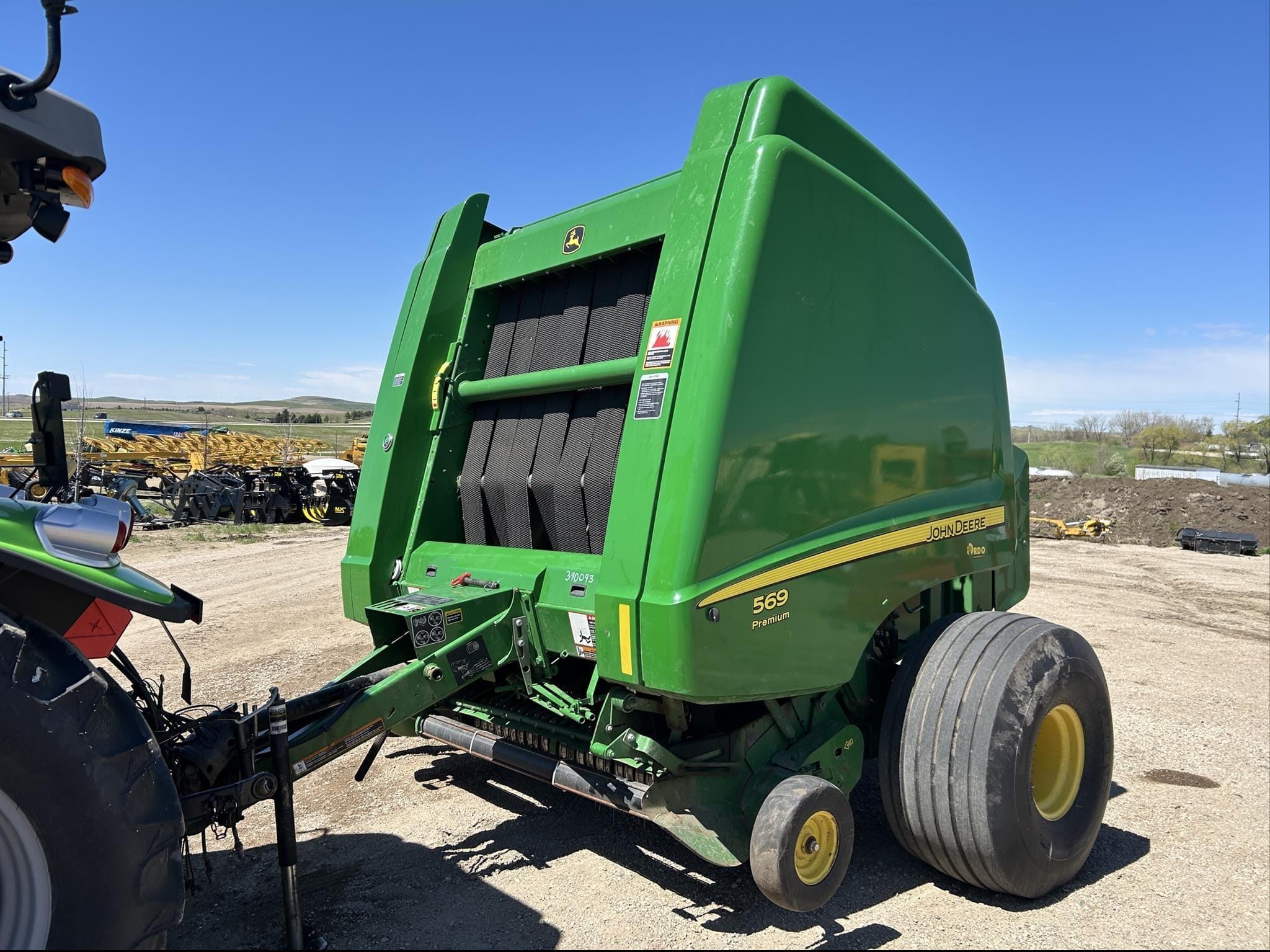 2012 John Deere 569 Premium Equipment Image0