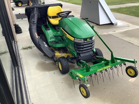 Image of John Deere X304 equipment image 4